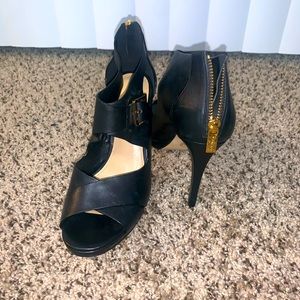 Strapped black Michael Kors heels